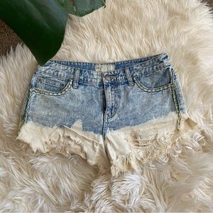Unique Free People Denim shorts with bleaching & stitch detail around hems